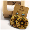 19 Aretes-Broquel Pirograbado